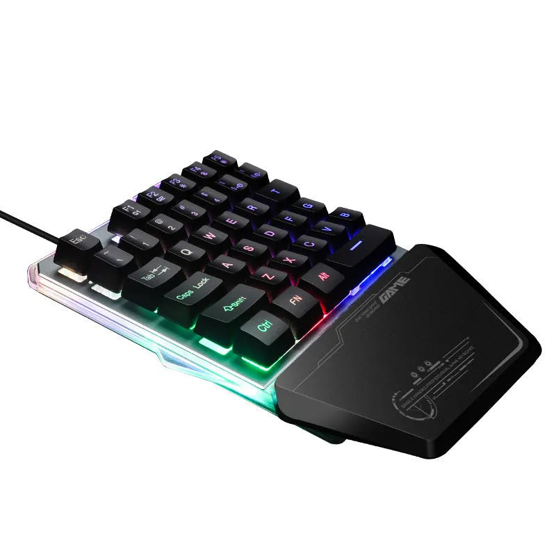 Black robotic one-handed G40 keyboard with RGB backlit keys on a desk.