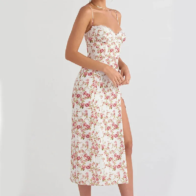 Women's blue lace flower print long dress with black suspender straps and a thigh-high side slit.