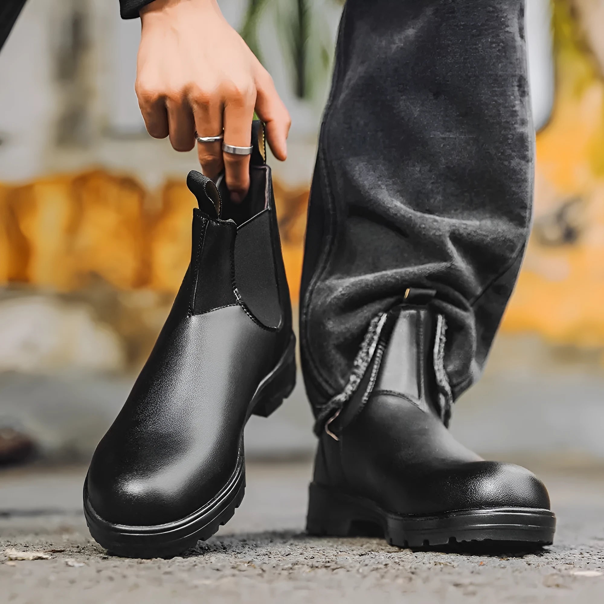 A pair of vintage-style unisex Chelsea boots in artificial PU leather with a beef tendon sole