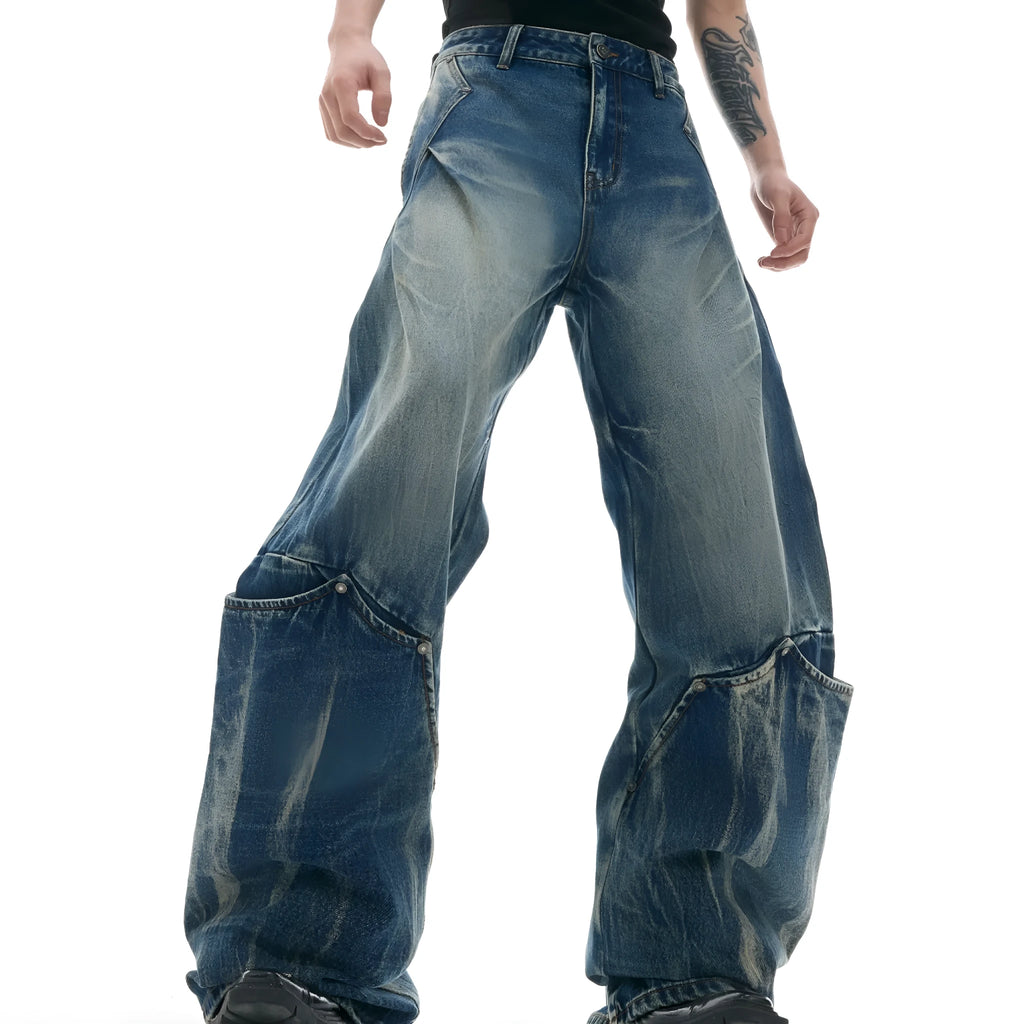 Men's verdant blue retro jeans with a curved knife cut and washed burst pattern