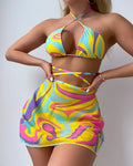 Yellow striped halter-neck swimsuit set for women with lace-up front, includes skirt and shorts