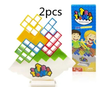 Colourful plastic balance stacking game with blocks, chassis, and base on a table