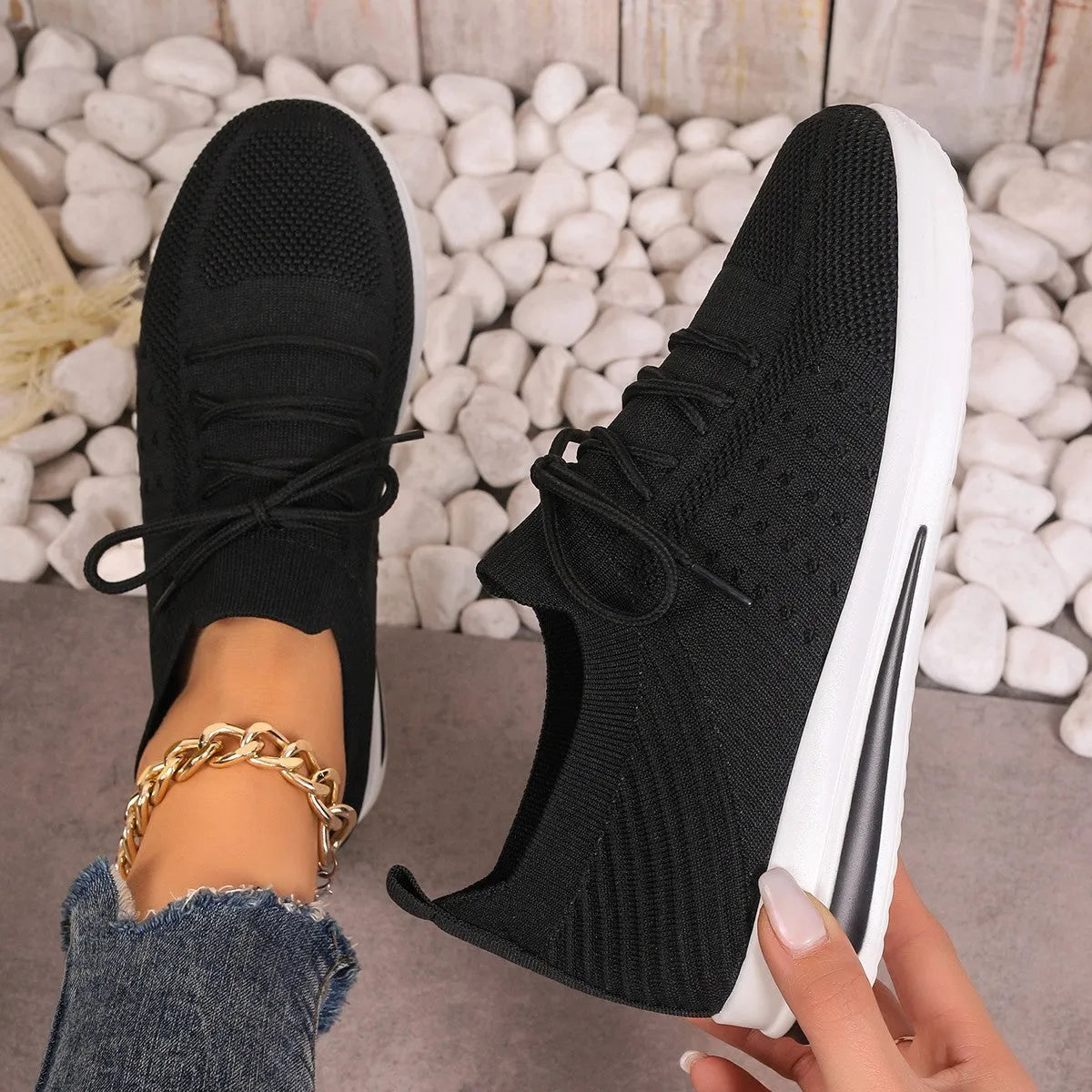 Women's low-top casual sneakers in red, black, or blue with round toe and front lace-up design.