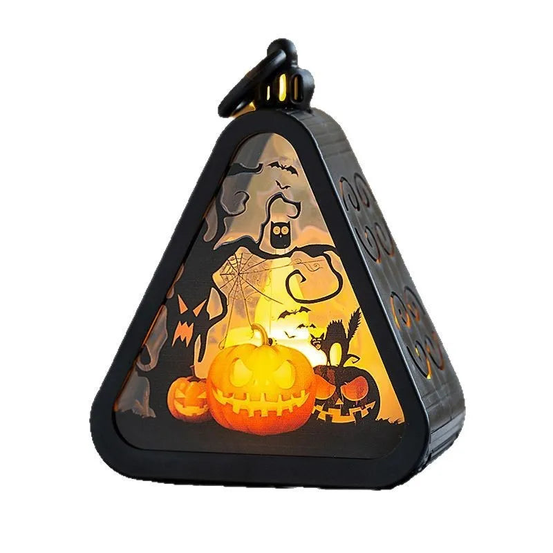 Halloween pumpkin lamp decoration in one of four designs: pumpkin, witch, castle or ghost hand