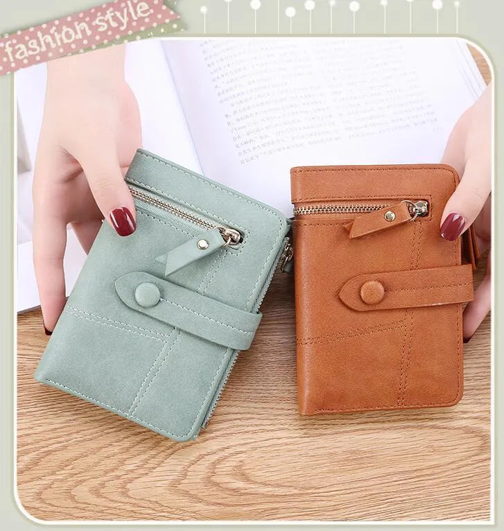 Faux leather standard short wallet with zipper closure, solid colour, showing multiple internal compartments