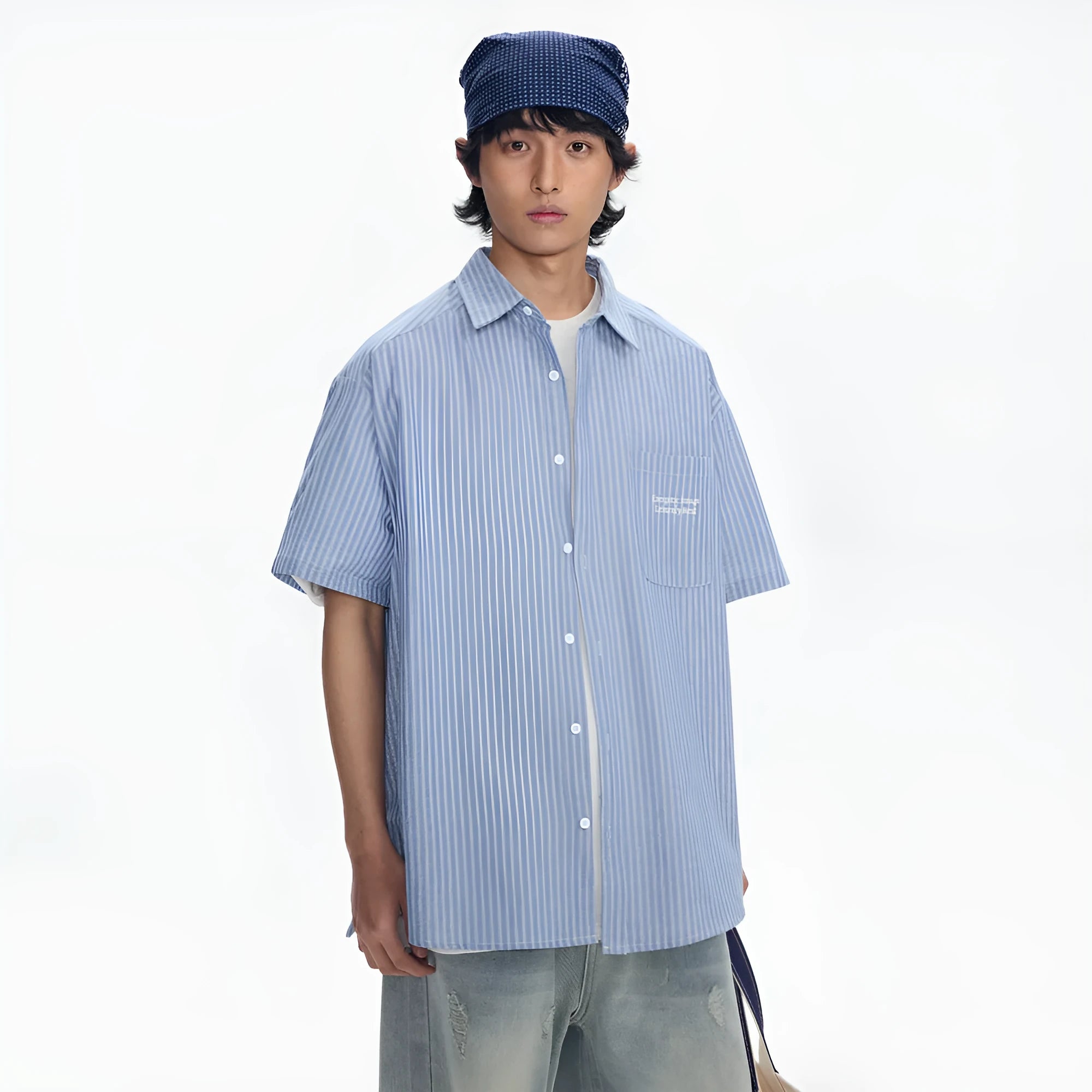 Blue striped short-sleeved shirt overalls with loose fit design on mannequin