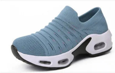 Women's stretch knitted sock shoes in various colours showing mesh upper and round toe design.
