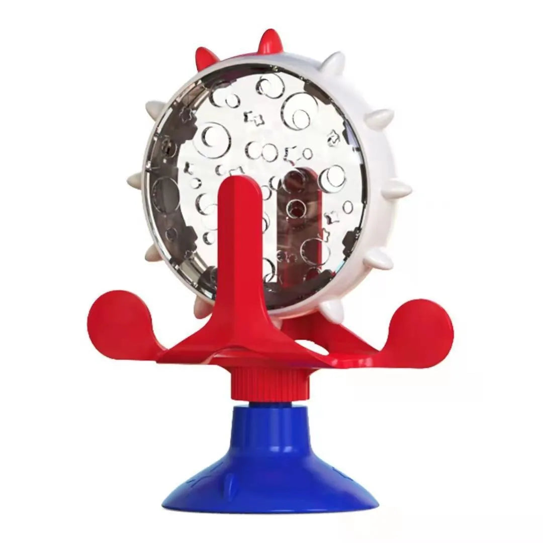 Interactive pet spinner toy in blue, green, red, or yellow with treat holes and suction base.