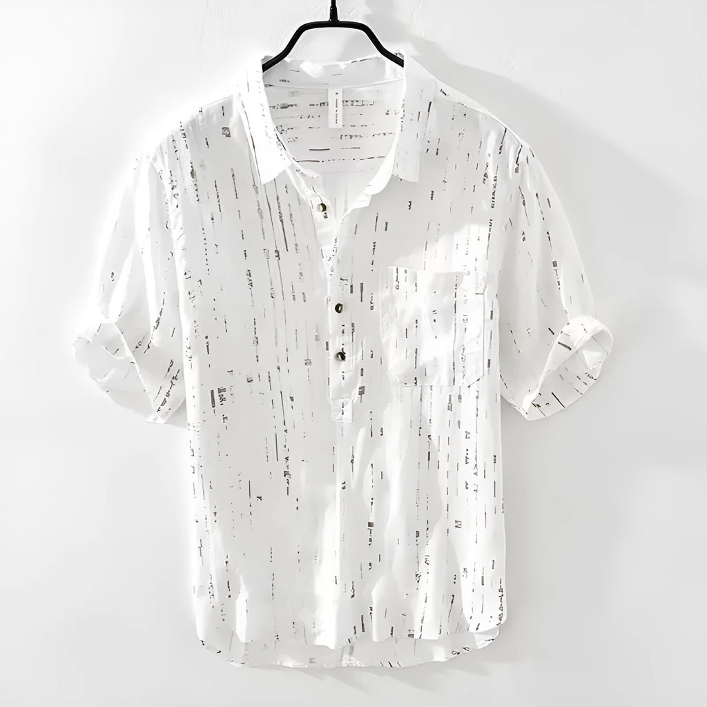 Man wearing a loose-fit black short-sleeved polo shirt, cardigan style, for casual summer wear.