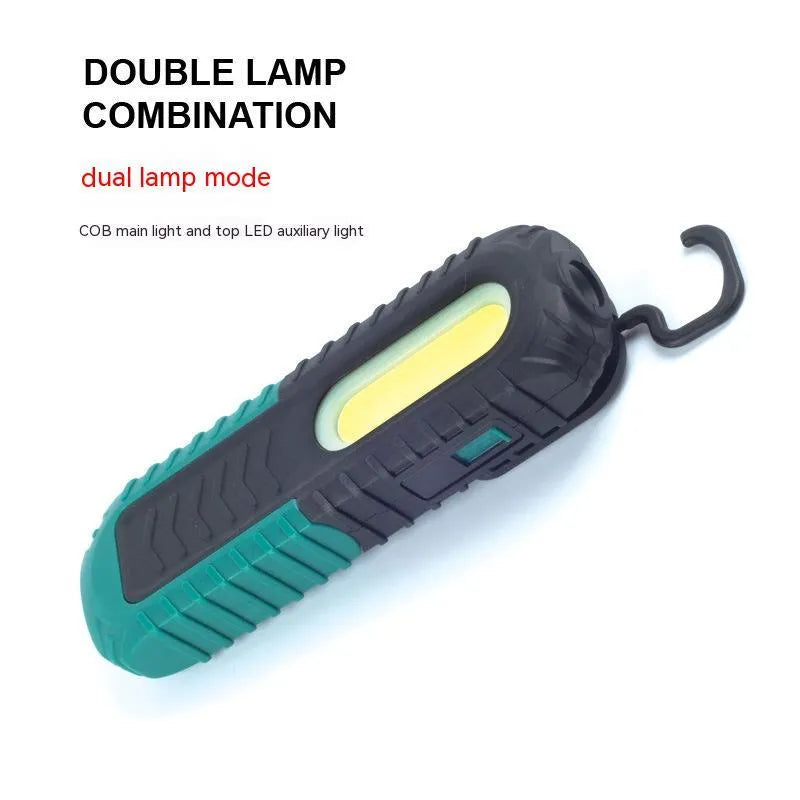 Black and green USB rechargeable auto repair work light with PET coating for drop resistance