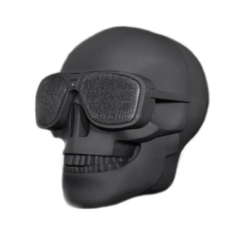 Skull-shaped wireless Bluetooth speaker in six colours with compact portable design and 10-hour battery