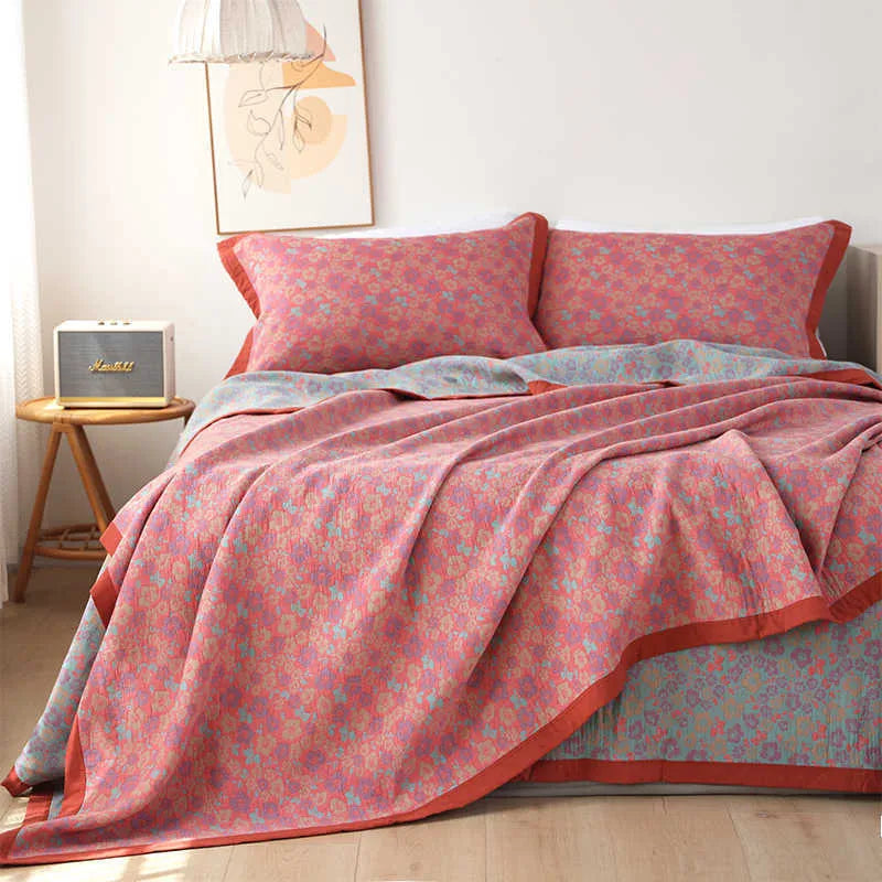 Cotton gauze bed blanket set with plant and flower pattern showing blanket and two pillowcases