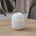 USB desktop humidifier with large spray, mute operation, and colour light in green plastic body