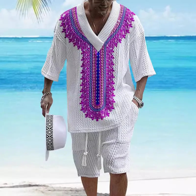Men's grey printed knitted short-sleeved top and matching shorts on a hanger.