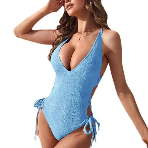 Women's backless tether bikini one-piece swimsuit in polyester fabric showing hollow design