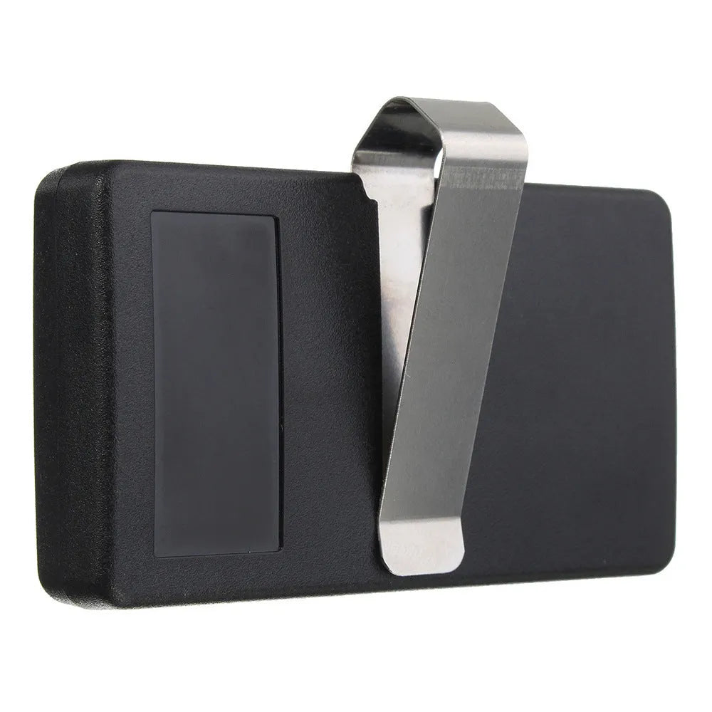 Black three-button garage door remote control on a white background.