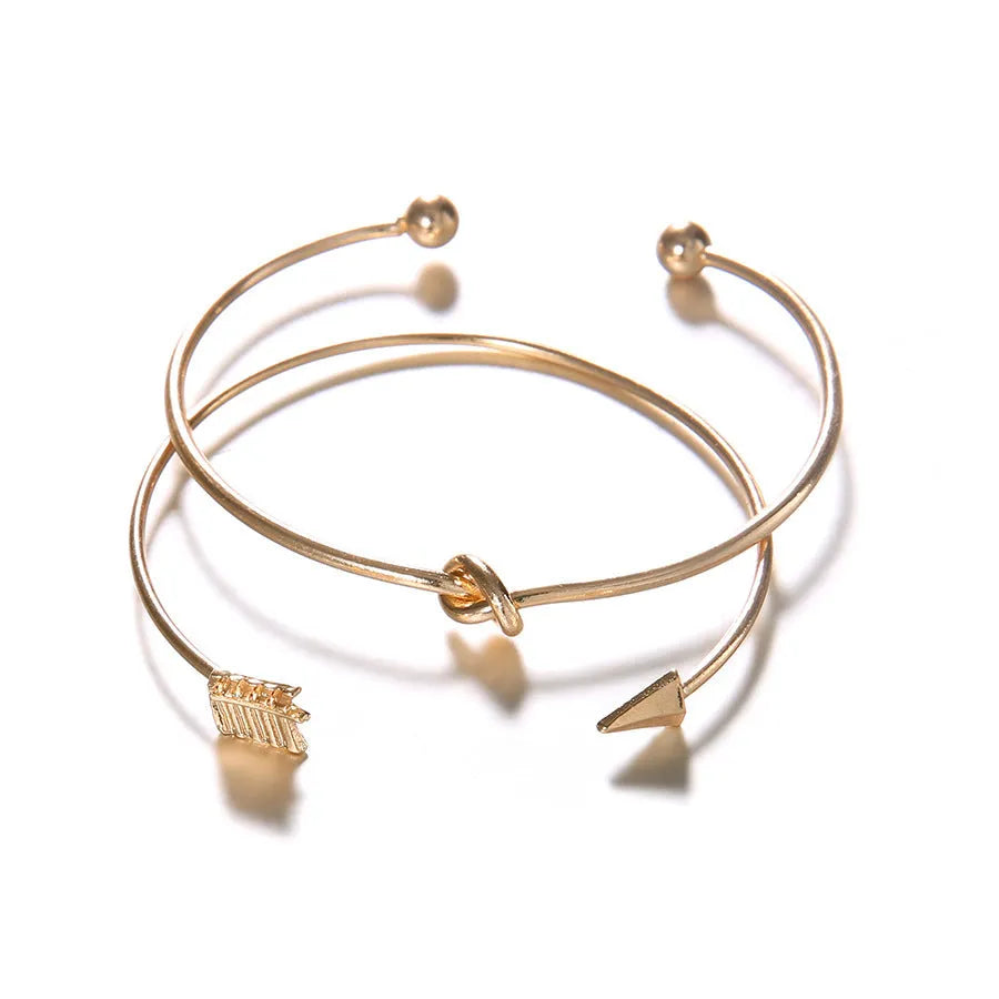 Women's gold electroplated alloy vintage cuff bracelet with knotted arrow design for European-American style jewellery