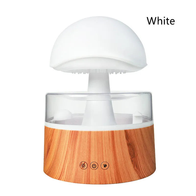 White cloud-shaped humidifier with falling raindrop effect and colour-changing LED lights