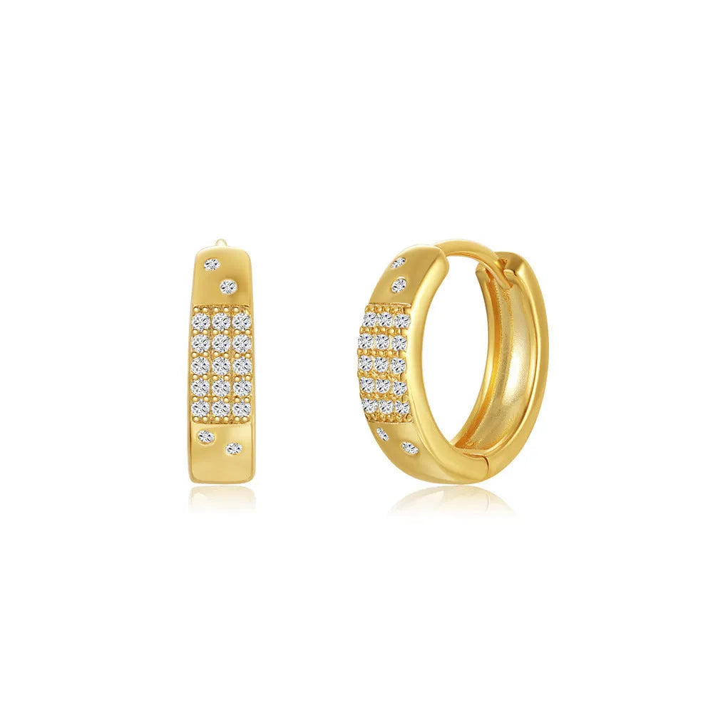 Geometric brass earclip earrings with round elements in golden and gold finishes