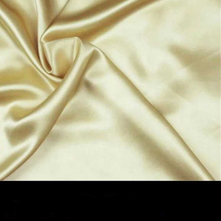 Double-sided 19 M silk pillowcase in apricot colour, showing reversible construction and standard UK size.