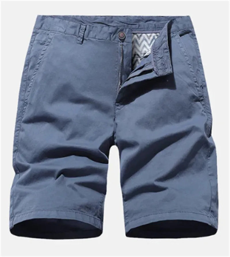 Men's straight-fit denim shorts in blue, shown on a hanger.