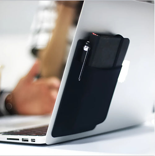 Black self-adhesive Lycra storage bag attached to back of laptop, 15x12cm, with pen loop and earphones visible