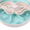 Rotating pet food bowl with silicone slow feeder mat in blue with windmill pattern design