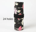 Square canvas pencil case with ballet girl print, shown open to display rolling storage for multiple pencils.