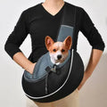 Women carrying black pet crossbody bag with small dog inside, Oxford material with drawstring closure