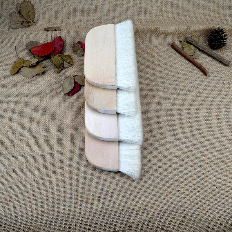 Wool fibre art brush for mounting paste and shading in picture colour.