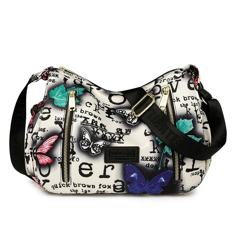 Graffiti casual crossbody bag in nylon with sewing line and print details, medium-soft build, single strap, dumpling shape