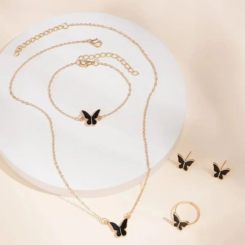 Five-piece butterfly pendant jewellery set for women including necklace earrings ring bracelet in black alloy electroplated finish