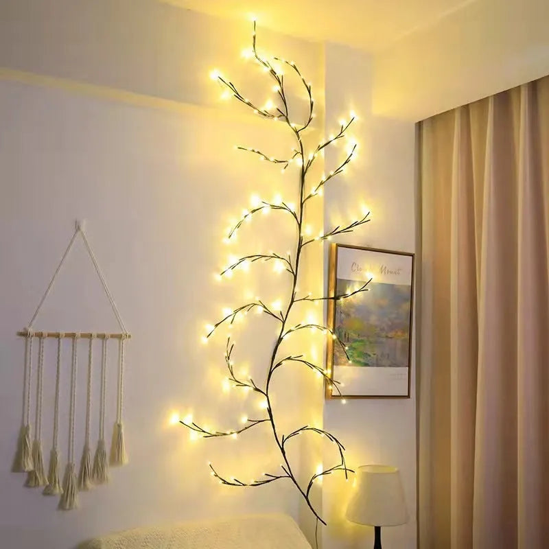Flexible LED vine light garland with warm white lights on textured birch-bark branches, shaped decoratively.