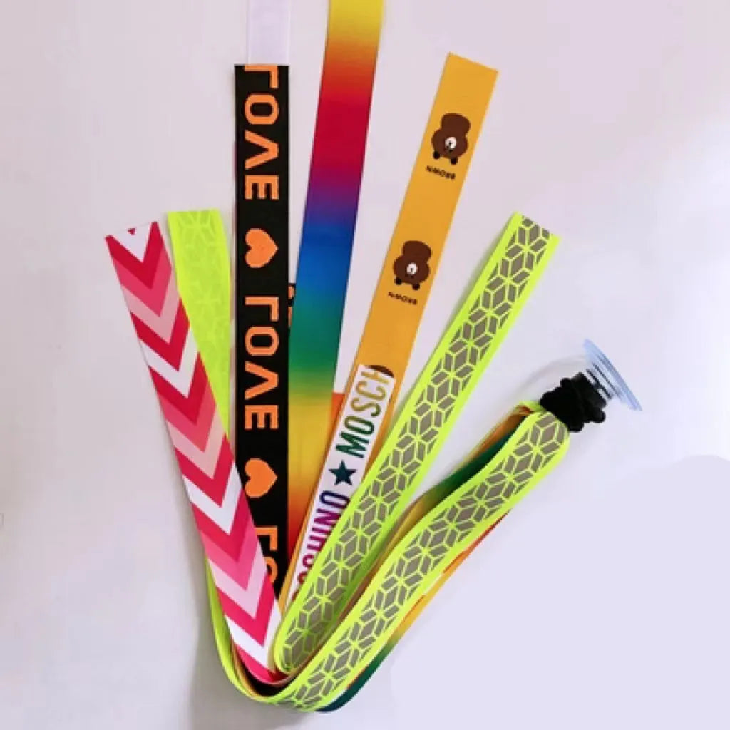 Colourful decorative ribbon streamers attached to a children safety helmet for skating or skiing