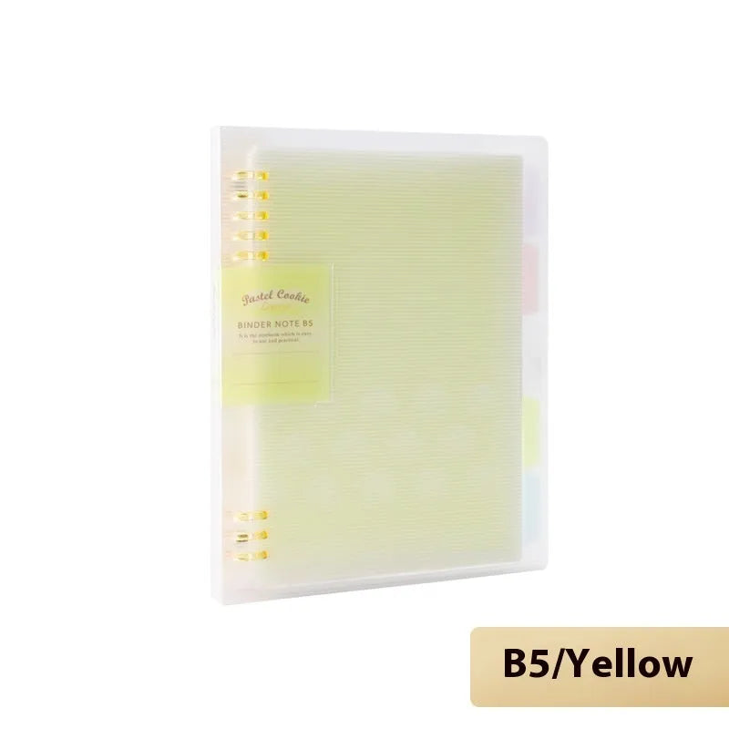 Loose-leaf spiral notebook with PP cover open, showing raw wood pulp pages in A5 or B5 size.