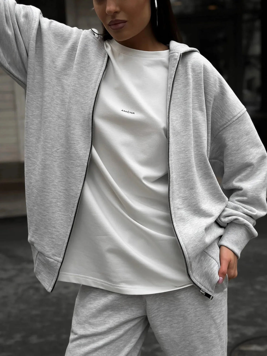 Street style two-piece set featuring long-sleeved coat and matching trousers in loose fit
