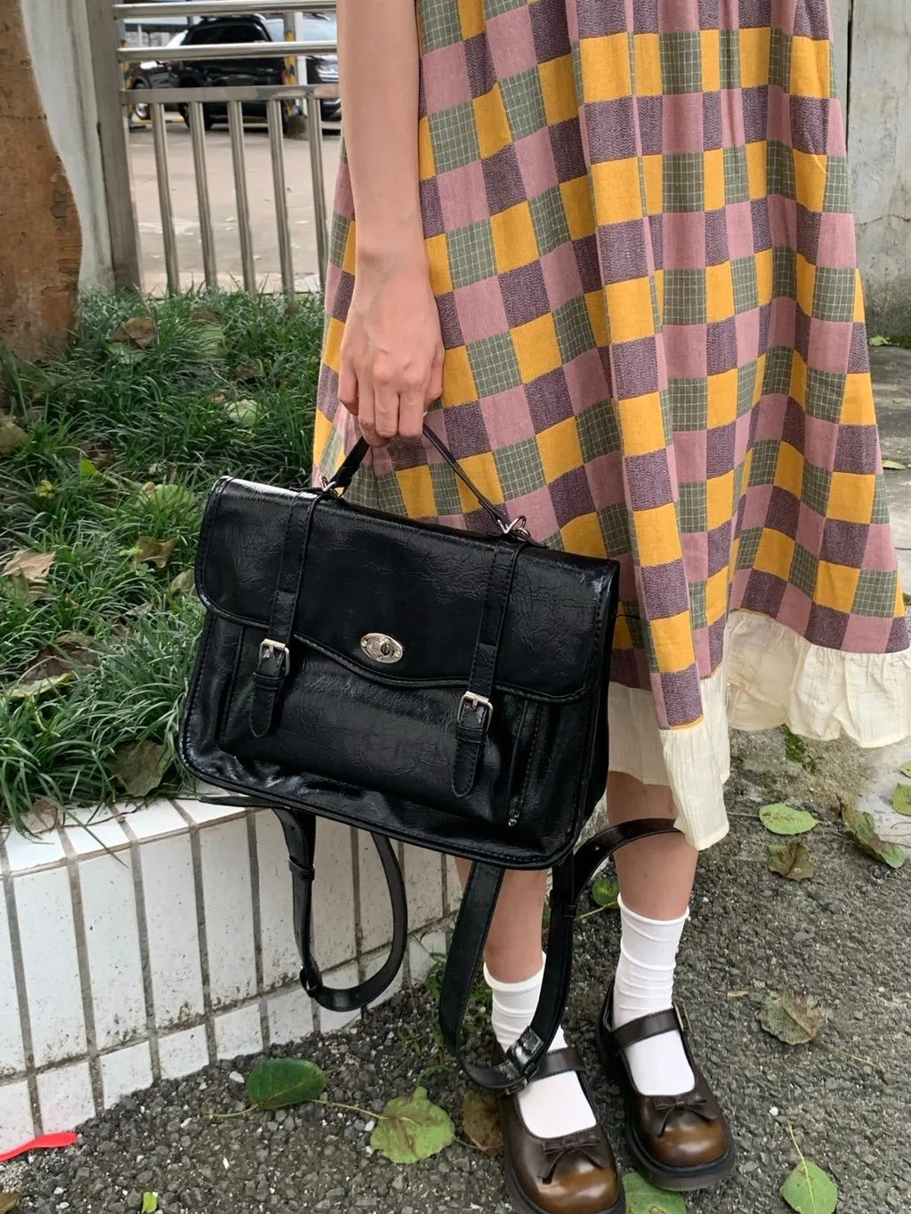 Black college messenger bag for women with oil wax leather look, 35cm length
