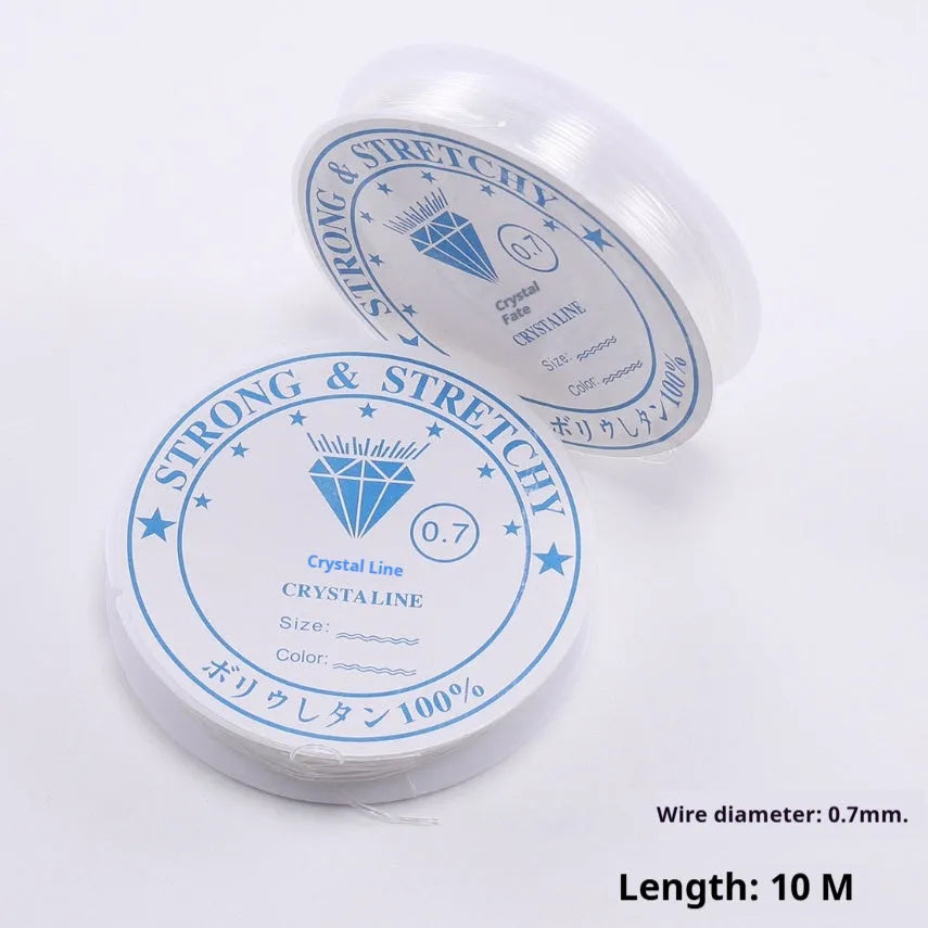 Clear white elastic fishing line on a reel for jewellery making and DIY crafts