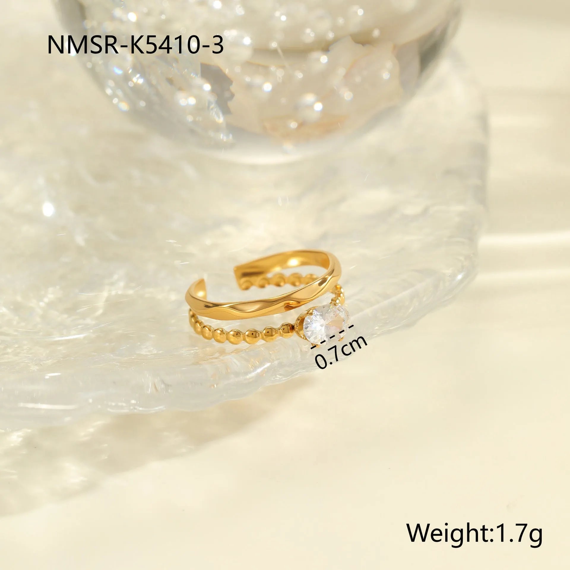 Stainless steel women's ring with gold electroplating and zircon details in geometry design