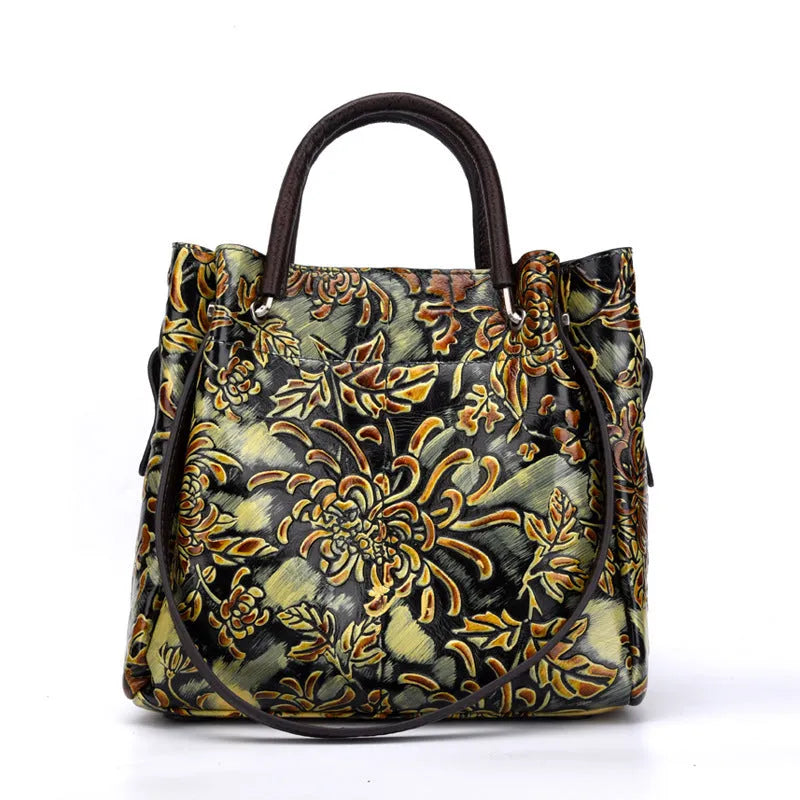 First layer cowhide women's messenger bag with embossed floral pattern, retro square shape, hard handle, and single shoulder strap in brown