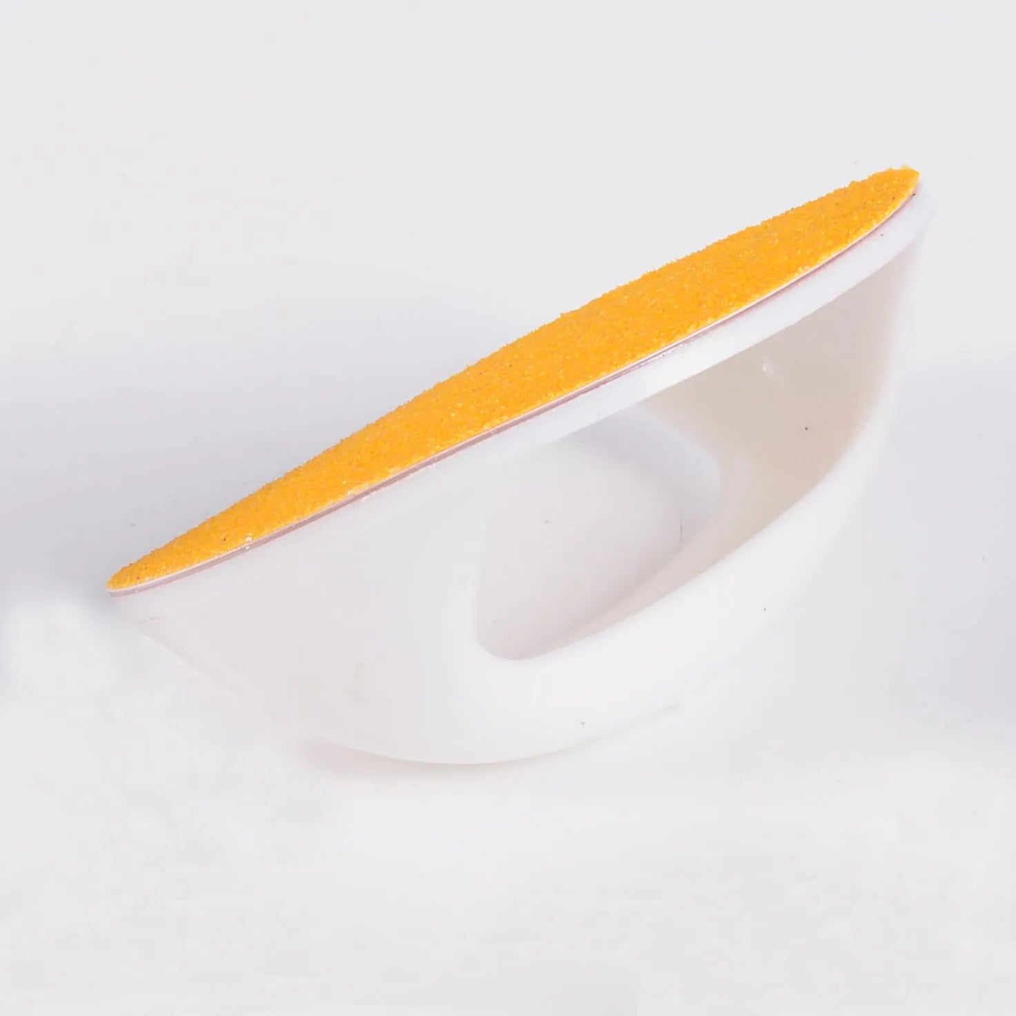 Square dog nail file board with ergonomic handle in chosen colour, showing replaceable sandpaper surface.