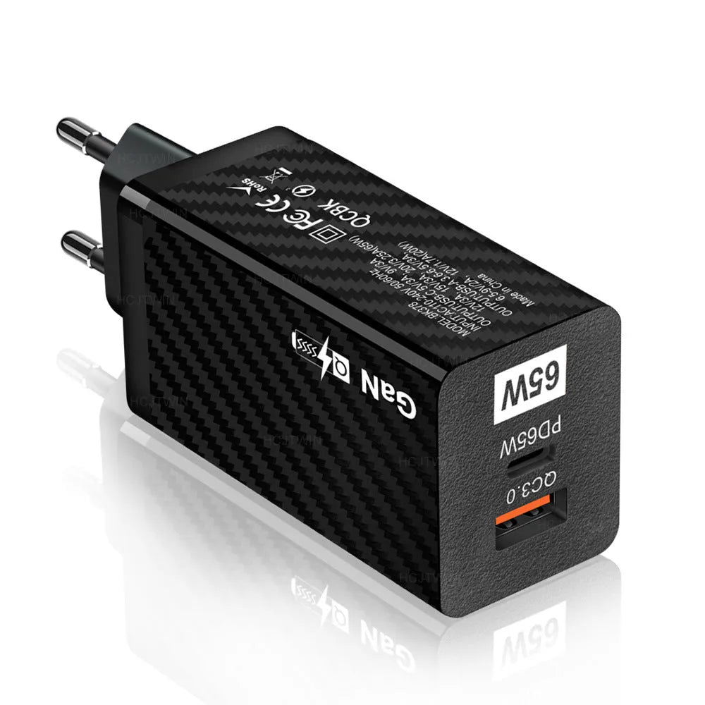 White gallium nitride GaN 65W laptop charger with USB-C port shown next to EU, UK, and US plug options