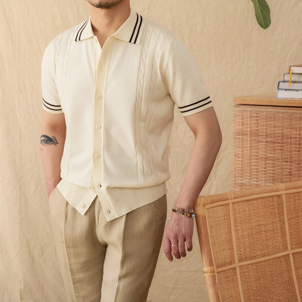 A short-sleeved lapel polo shirt in a cotton blend fabric, shown in apricot colour on a hanger.