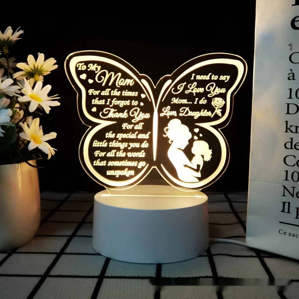 White heart-shaped USB table lamp with touch switch on a wooden surface.