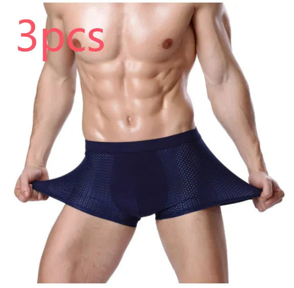 Men's solid colour modal boxer briefs with U-convex pouch design and mesh panel.