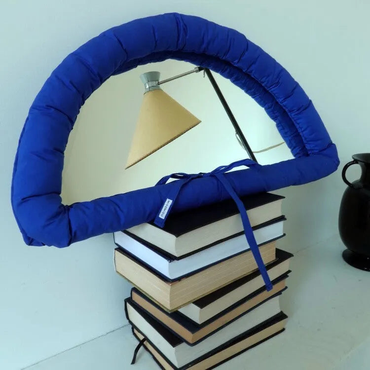 Hanging fabric mirror with soft cotton padding for photography backgrounds in solid colours
