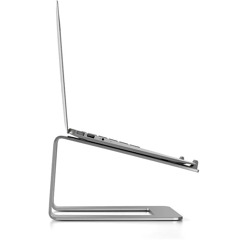 Aluminium alloy laptop stand in black or silver measuring 29.9 x 25.8 x 18.5 cm on a desk