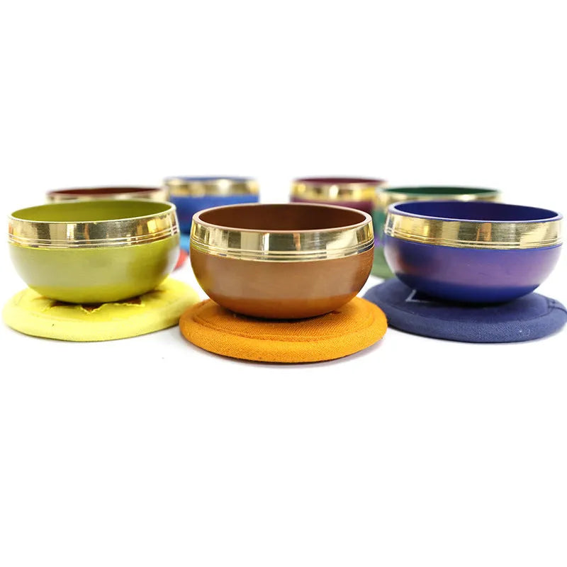 Handmade Himalaya singing bowl in one of seven colours: orange red, green, blue, sky blue, purple, yellow, or red