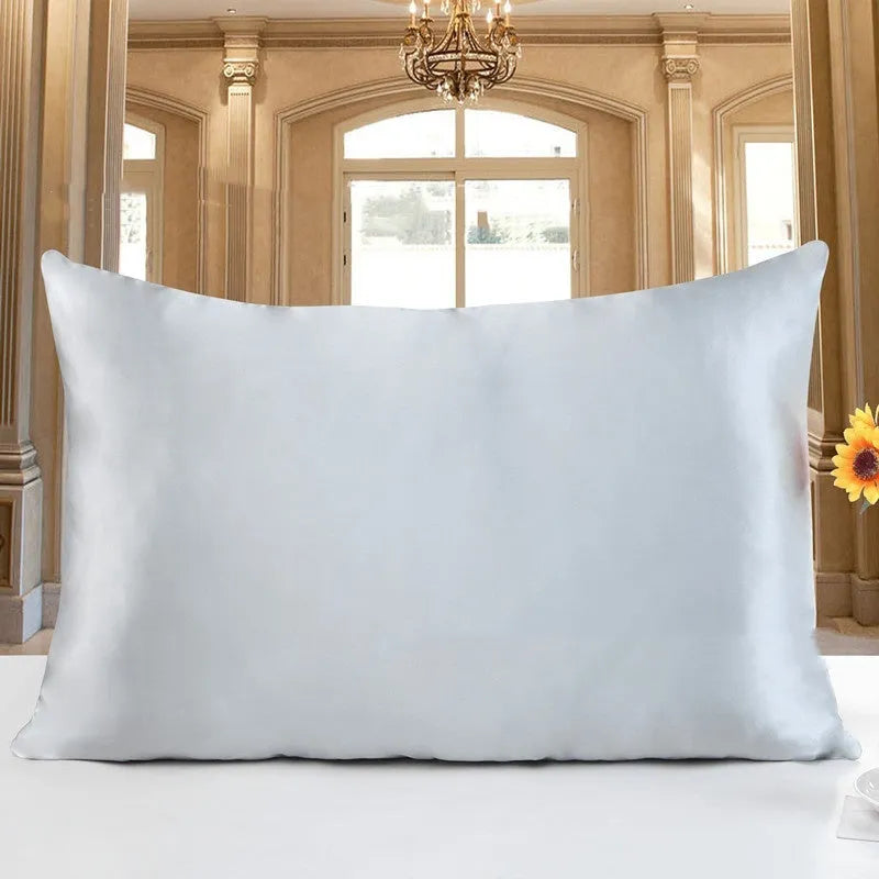 Double-sided 19 M silk pillowcase in apricot colour, showing reversible construction and standard UK size.