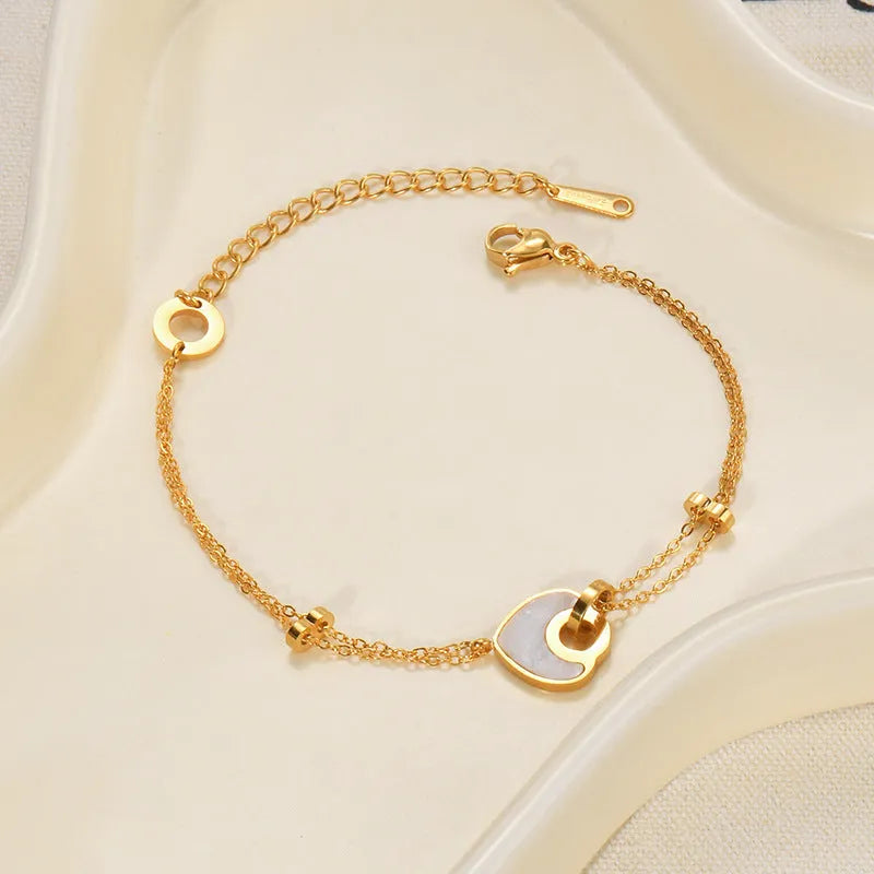 Stainless steel resin bracelet for women featuring heart-shaped design and double-layer construction